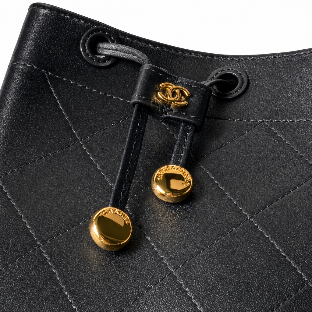 Chanel Bucket Bag Black Quilted Lambskin | Gold CC Drawstring & Mauve Interior — 23cm